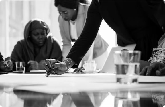 Office workers dicussing during meeting